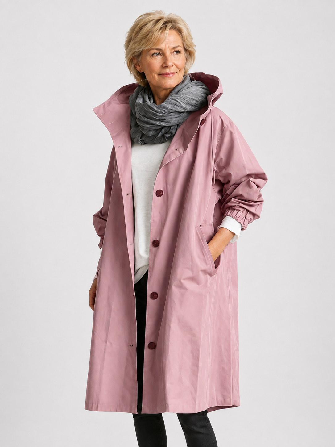 Imperméable femme avec capuche et ceinture – manteau de pluie élégant