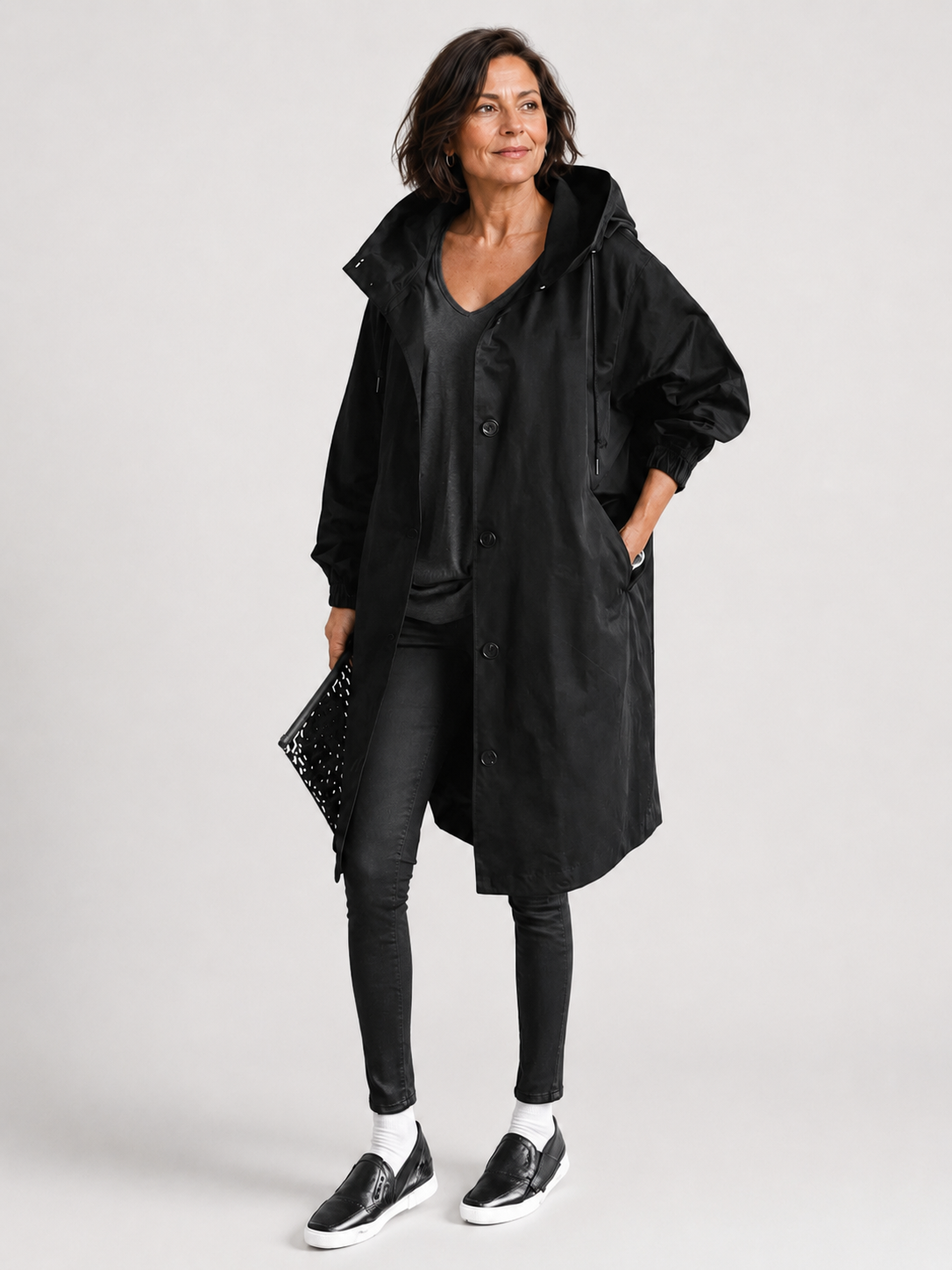 Imperméable femme avec capuche et ceinture – manteau de pluie élégant