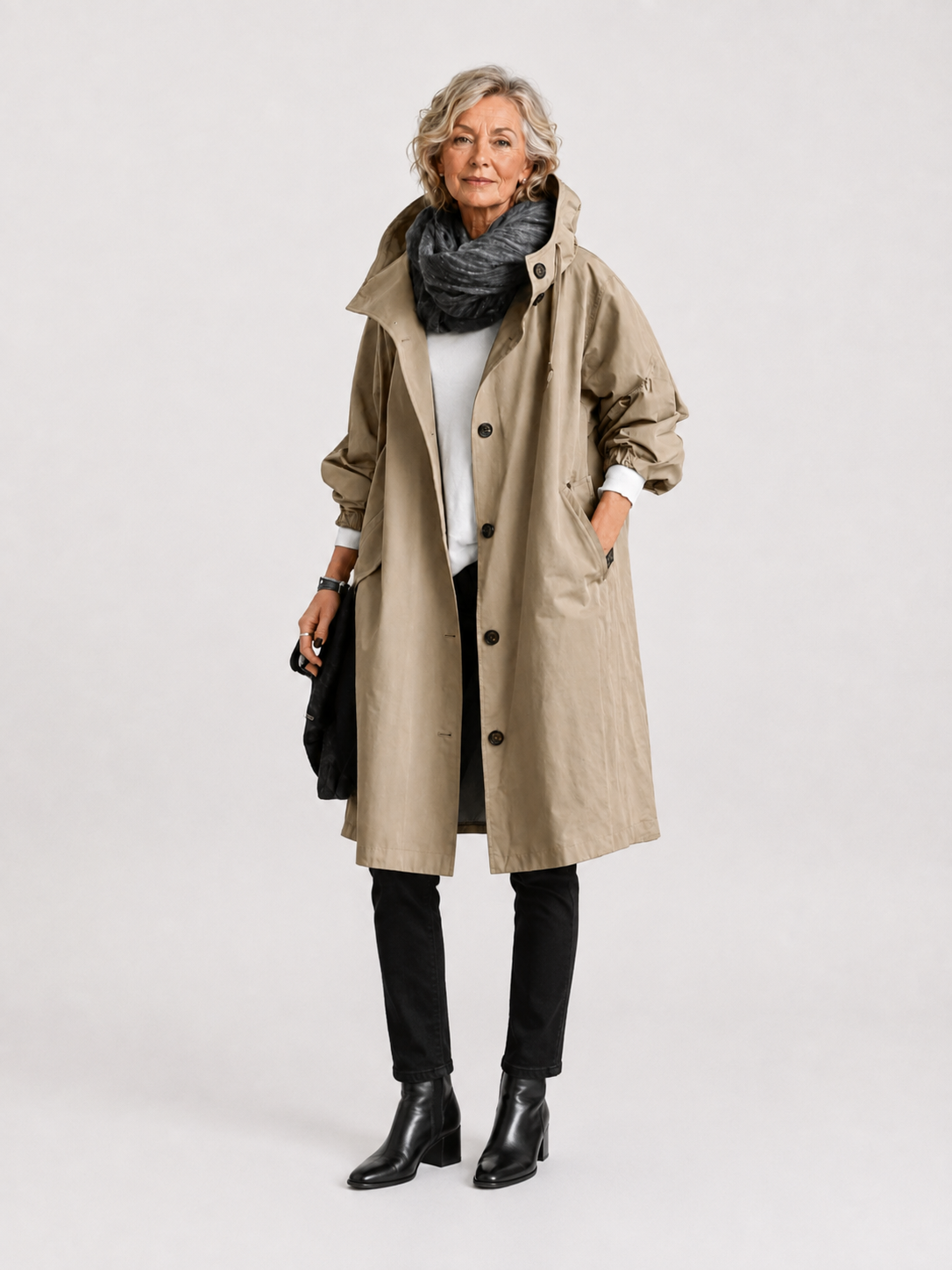Imperméable femme avec capuche et ceinture – manteau de pluie élégant